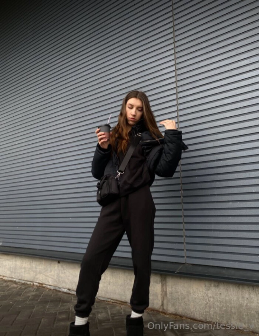 Strolling through the day draped in chic black where every step feels 