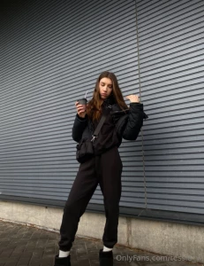 Strolling through the day draped in chic black where every step feels