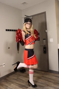 Here are 4 pictures of me in my new cheerleader outfit part 1