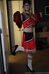 Here are 4 pictures of me in my new cheerleader outfit part 2