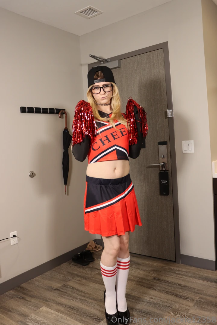 Here are 4 pictures of me in my new cheerleader outfit 
