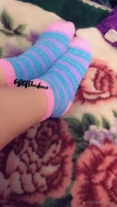 Footplay in fuzzy socks and then stripping them off with my toes and