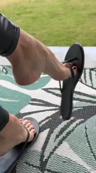 Dangling in the storm flip flops dangle on a stormy morning 