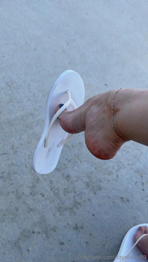 Dangling again white flip flop dangle and drop with arching at the end 