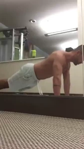 Shirtless push-ups getting ready for a shoot on dominicpacifico com