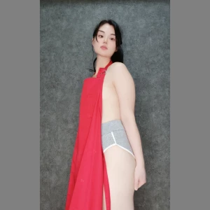 Only wearing the essentials in the kitchen apron included