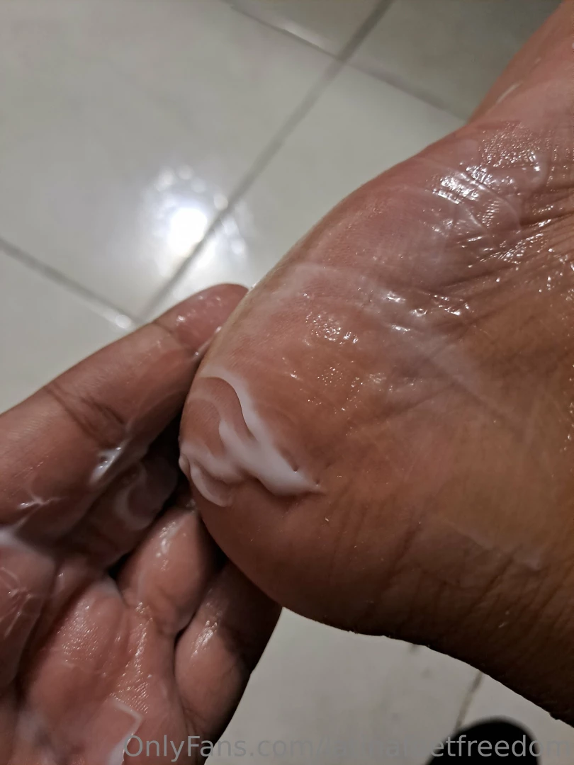 Cleaning and rubbing my tired feet with cream 