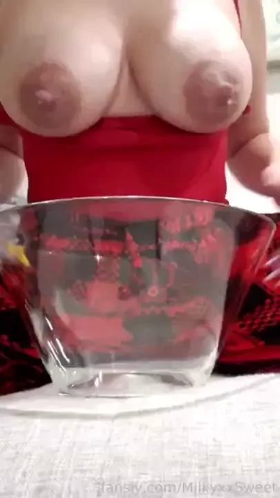 Pumping into a glass bowl engorged and in pain i empty my milky 