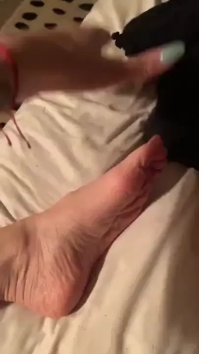 Taking off my socks and rubbing my feet for u 