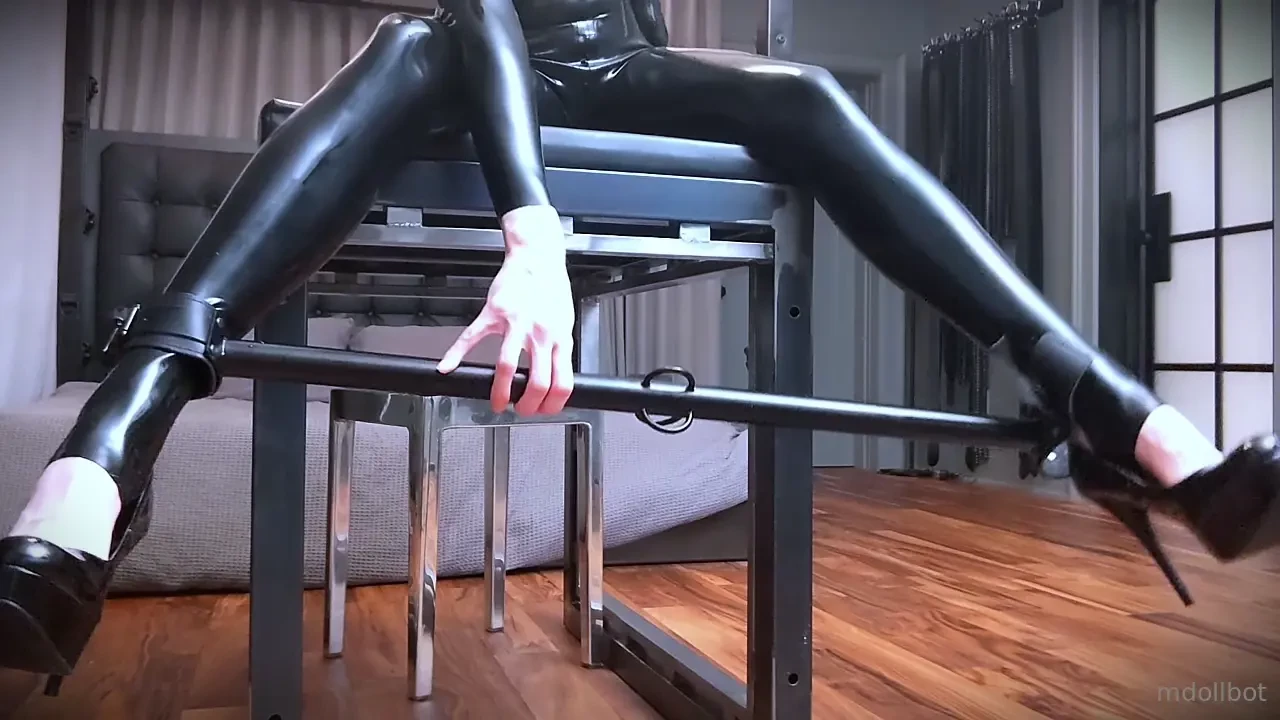 Indulging in some self-bondage with heels and a spreader bar really 