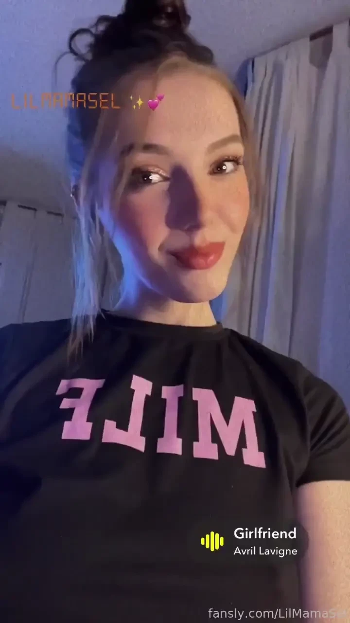 Amp i m sitting in nothing but a tiny pink thong and a black crop top 