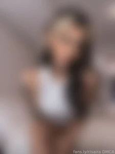 This elf is ready to unwind for the night dressed in a cute white