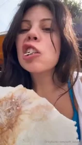 Eating a prawn cracker while visiting tsukiji market in tokyo