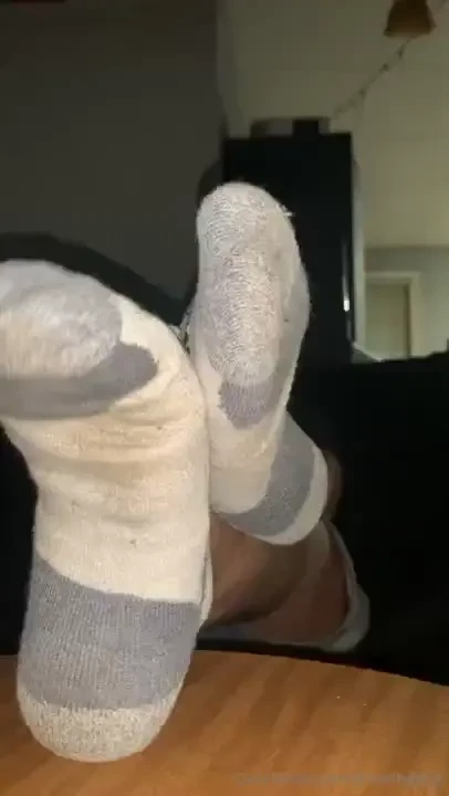 Playing videogames sniff my feet 