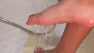 Feet soapy feet under the shower