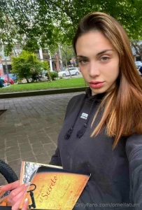 If you see a beautiful lonely girl on the street with a book in her