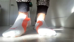 Tiny shrunken couple and big feet with some sock lint turn up volume