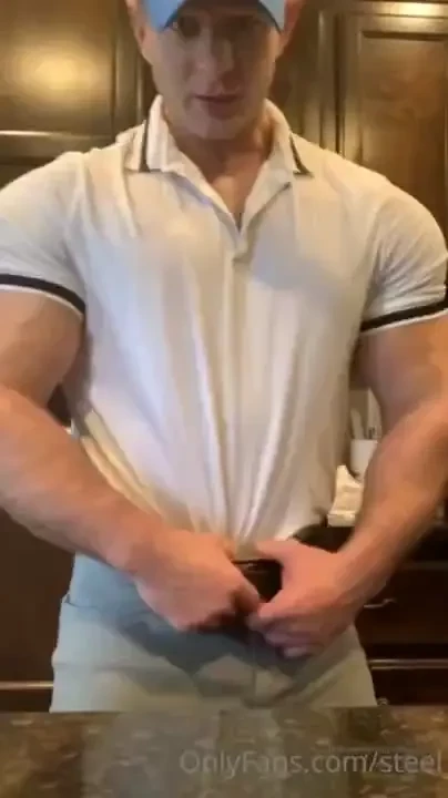 Teenis player steel bouncing his pecs after his golf match 
