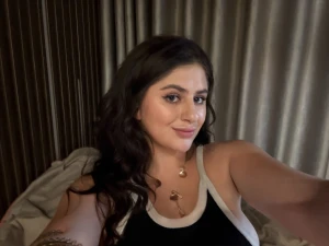 Flirting with the camera and maybe with you