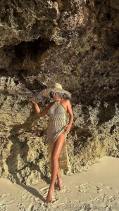 Sand under my feet a warm breeze and me - in a light dress sliding
