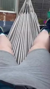 The sun is shining and i m chilling in the garden in my hammock care