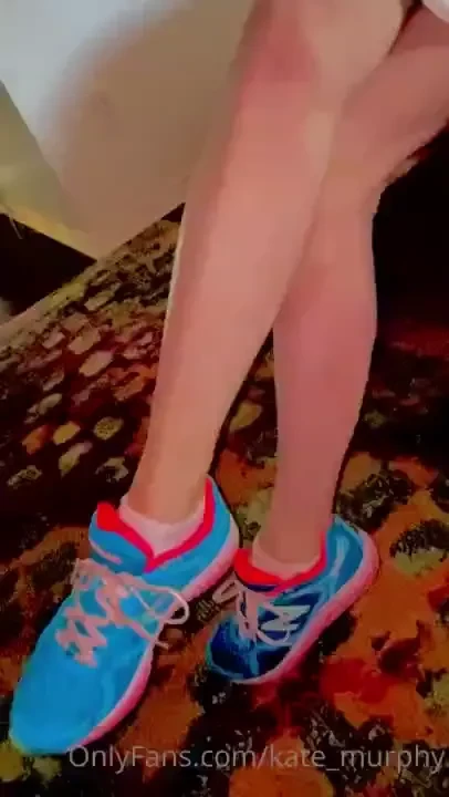 Preparing to take off these sweaty trainers after a long walk the 
