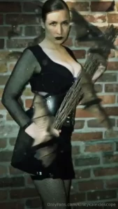 Raven hair and ruby lips sparks fly from her fingertips echoed voices