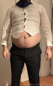 Trying on an old shirt and suit buttons were popped but nobody was part 1