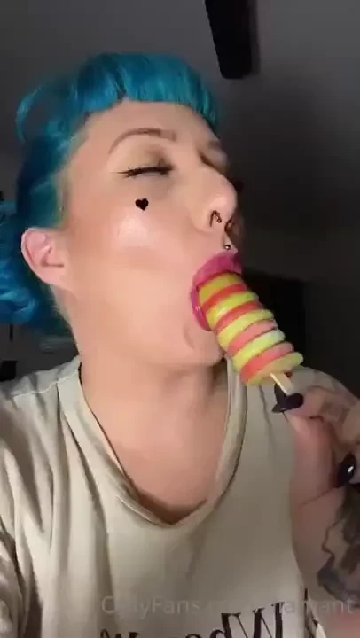 Licking and sucking a delicious icy pole 