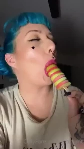 Licking and sucking a delicious icy pole
