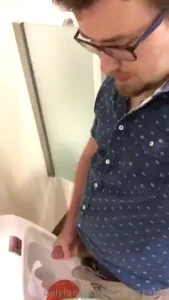 Stroking at a urinal