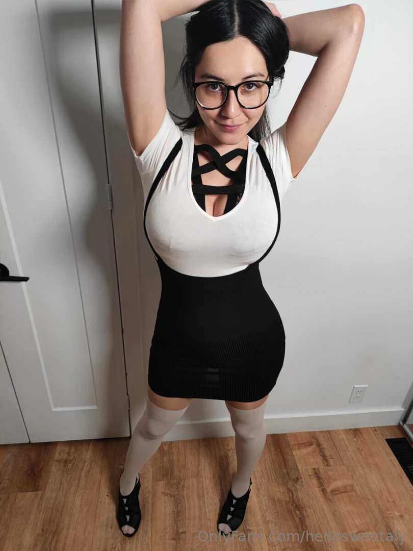 1054 - white top and faux stocking pantyhose with a black skirt and 