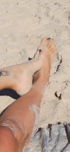 My beautiful vacation feet rubbing against the warm sand need a