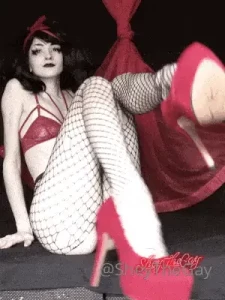 In case you were interested in some fishnet stiletto leg and ass