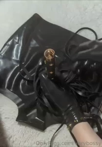 Watch as my hands glide over the smooth surface of latex gloves