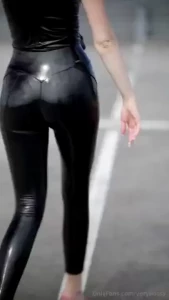 You wanted more of this shiny black outfit