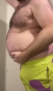 Super stuffed belly and fat chat in tiny patrick star shorts with a