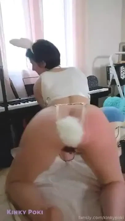 Happy easter this little white bunny can t stop playing with a carrot 