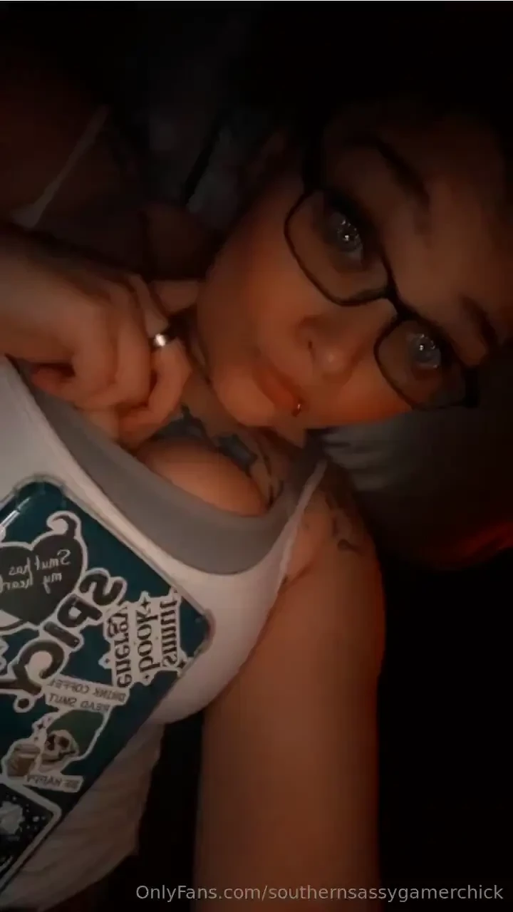 Reading haunting adeline laying in bed listening to music 