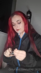 Blowing smoke into the camera and speaking in finnish