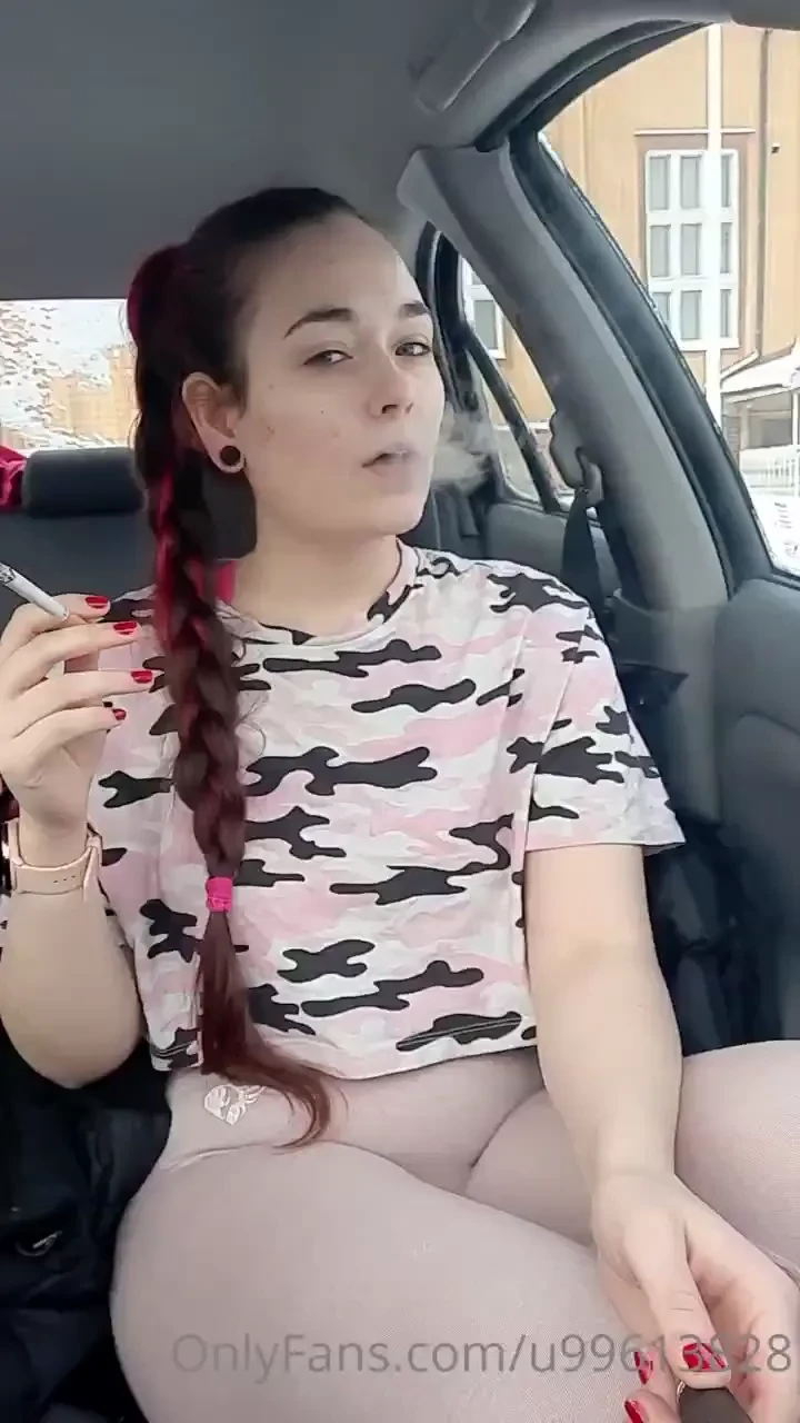 Sitting in a car smoking an after gym cig 