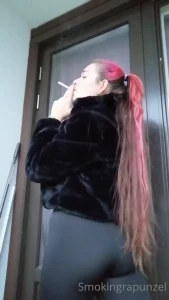 Smoking in an all black outfit showing off my ass in leggings