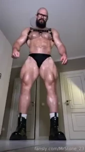 Flexing that huge tree trunks muscle hairy beard mustache flex