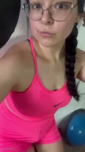 Dirty girl doing bike in the gym