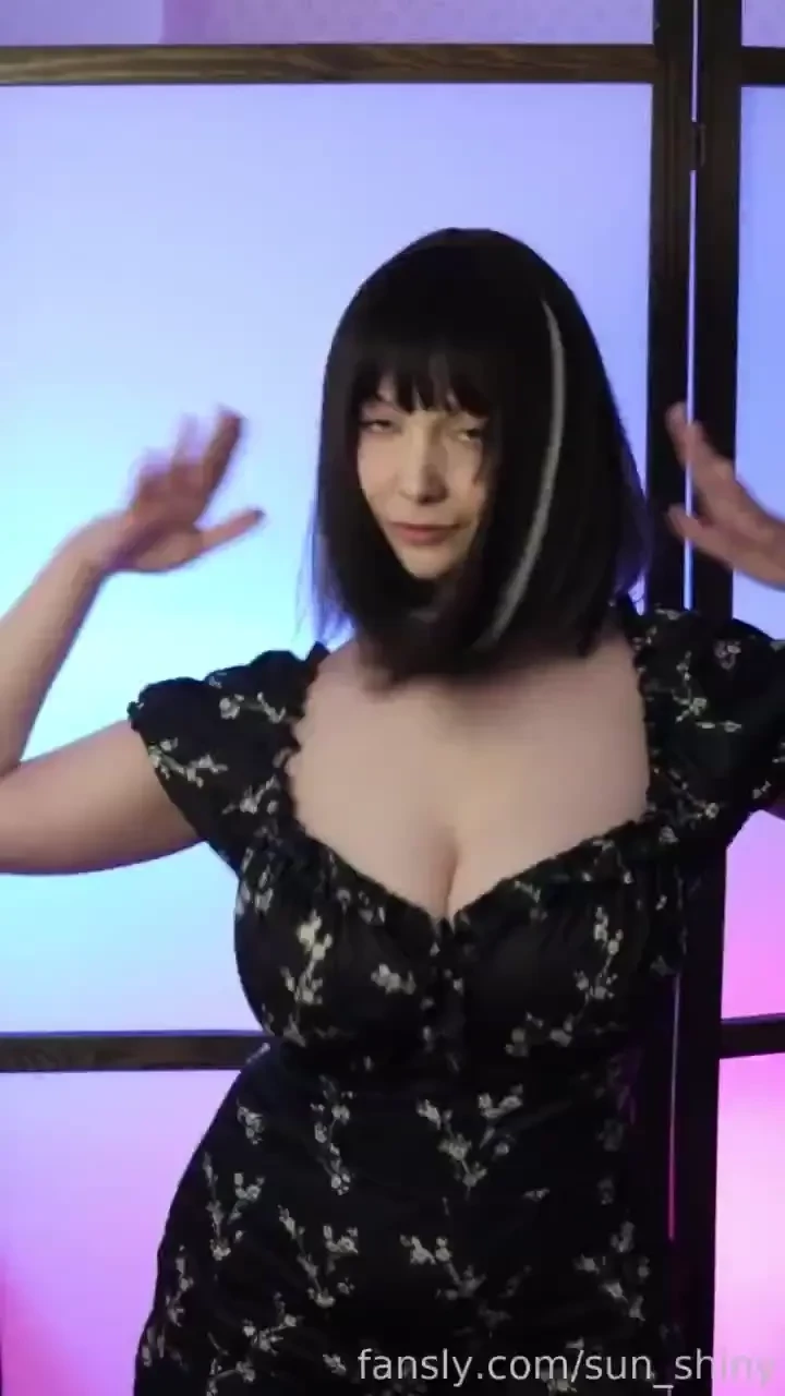 A black dress and a deep neckline the perfect combination for hypnosis 