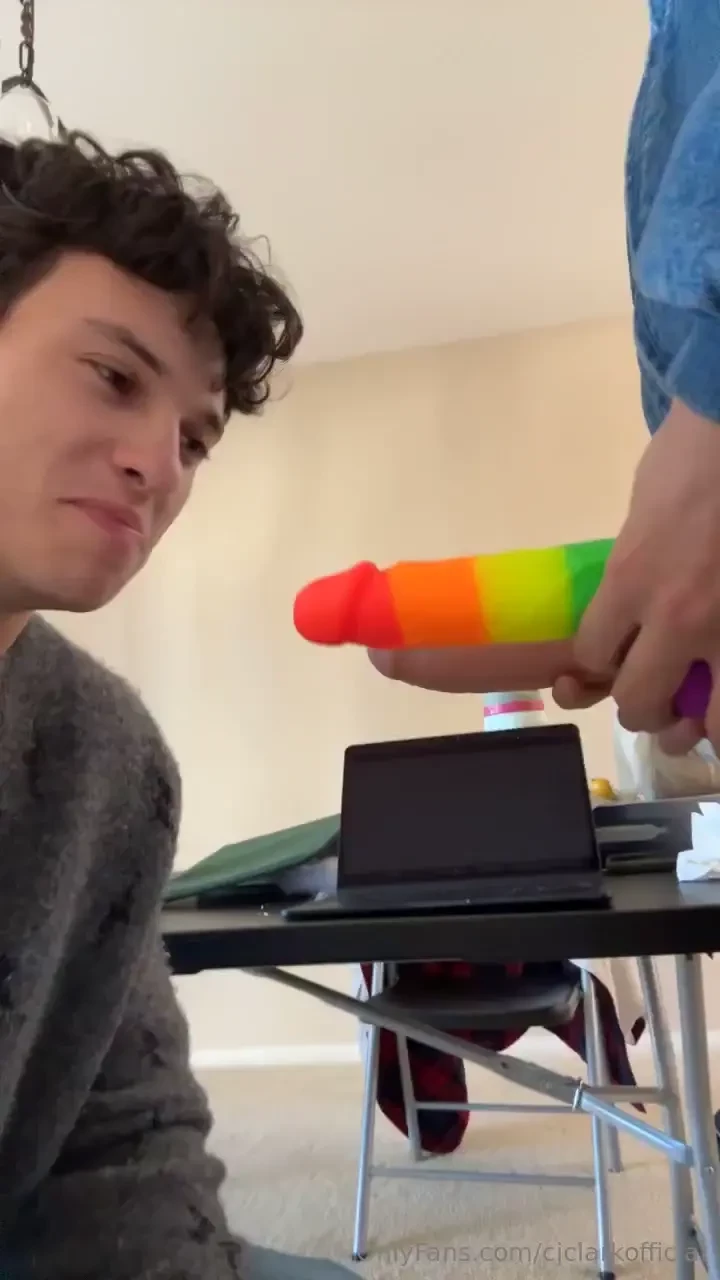 Sucking a dildo while my friend holds it by his cock to show him how i 