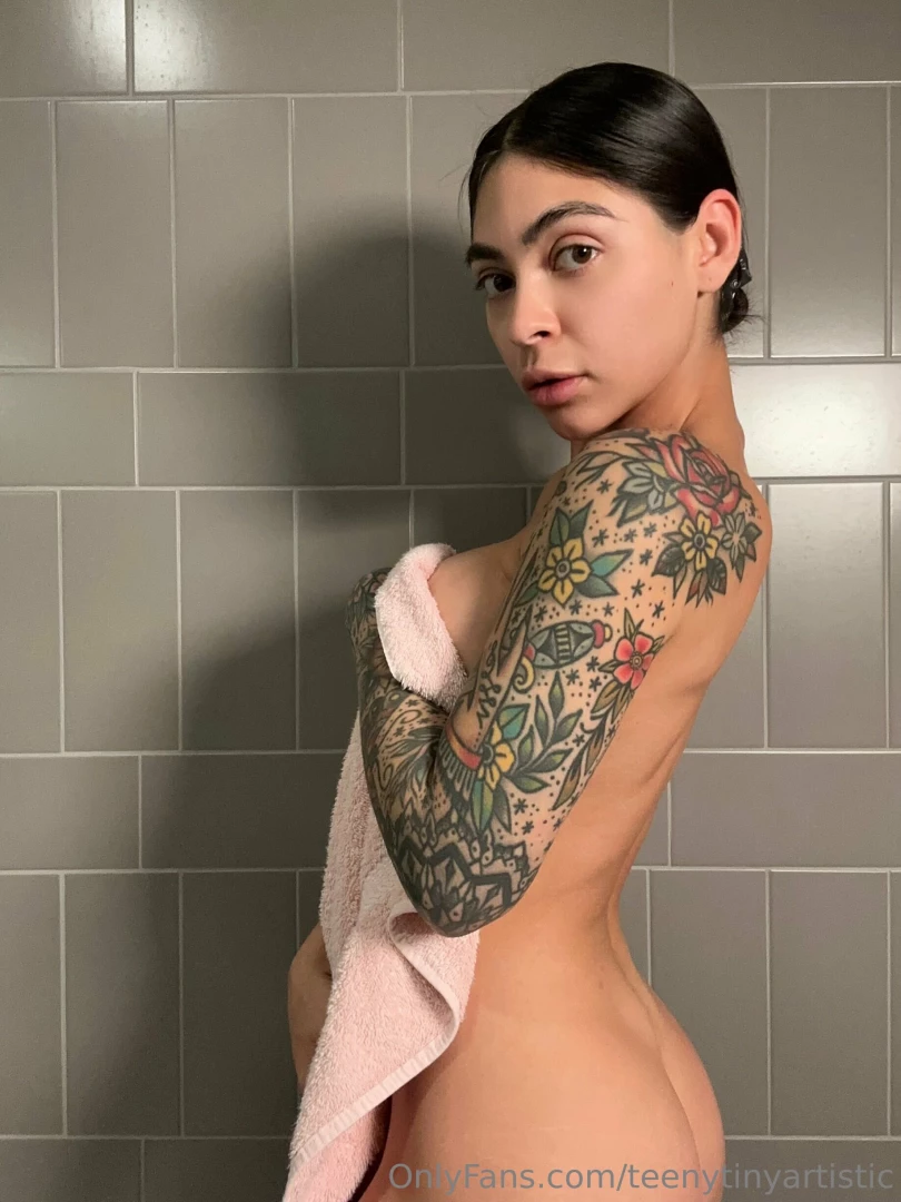 Wrapped in confidence and ink embracing the art of self expression 