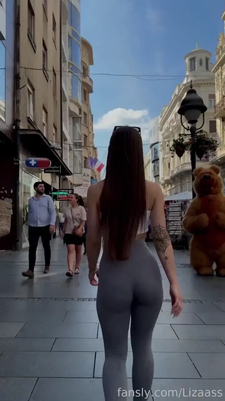 Strollin through the city streets turning heads with every step and 