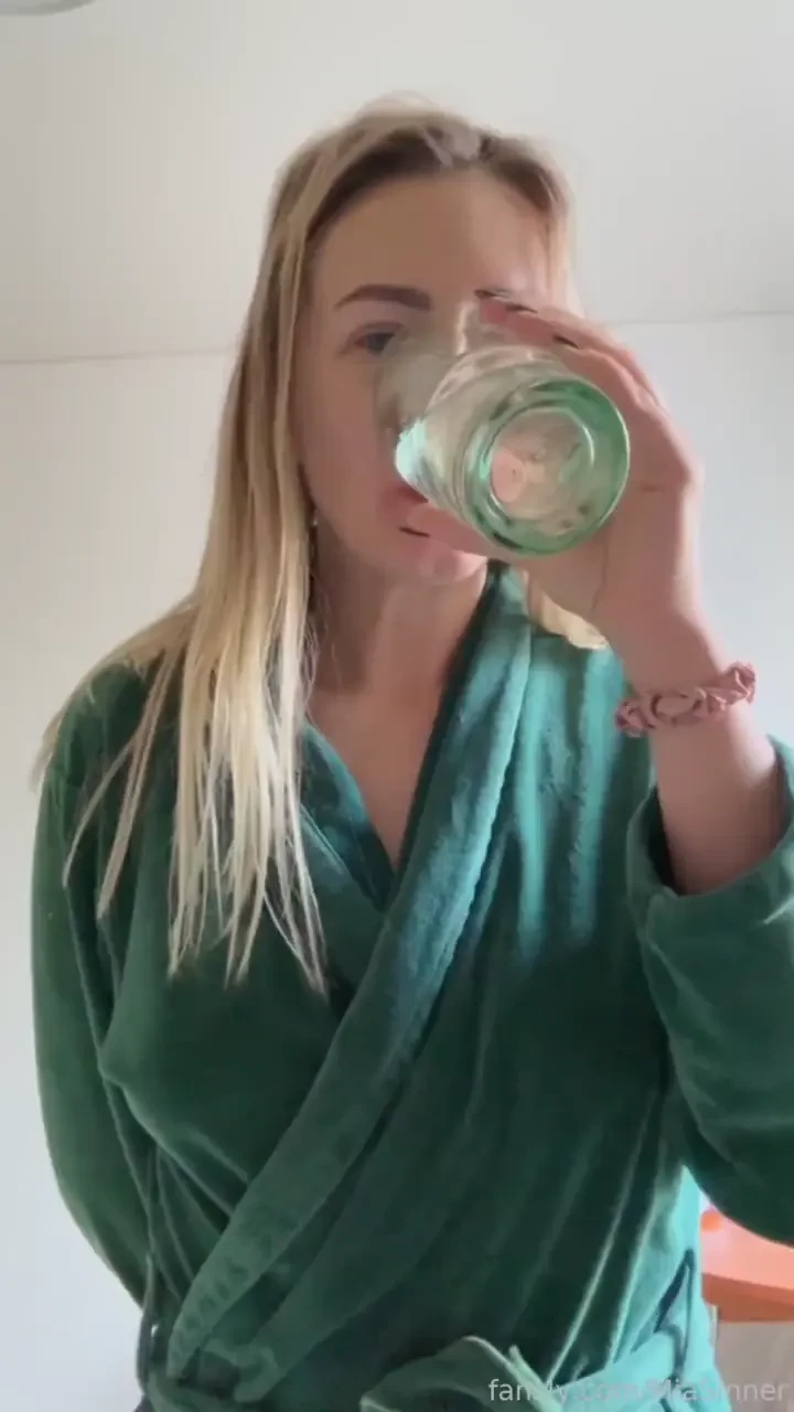 Kinky water break after drinking a glass of water in preparation for 