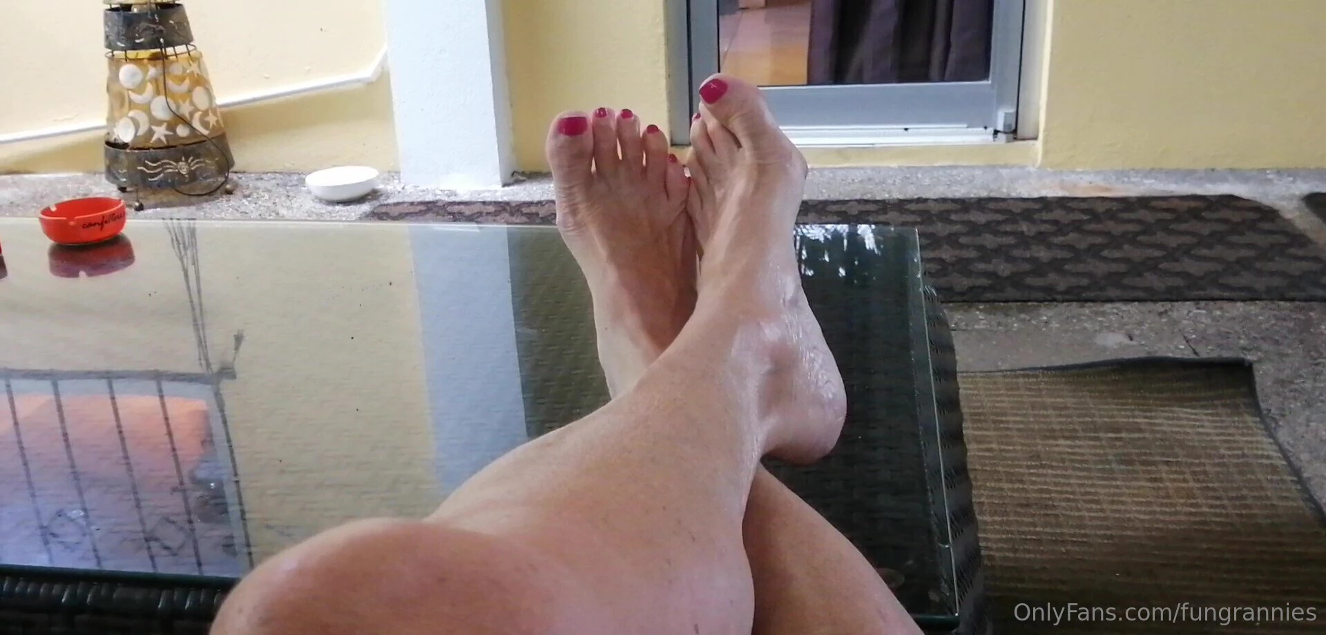 Wank to the sound of the tropical rain splashing on my feet for the 